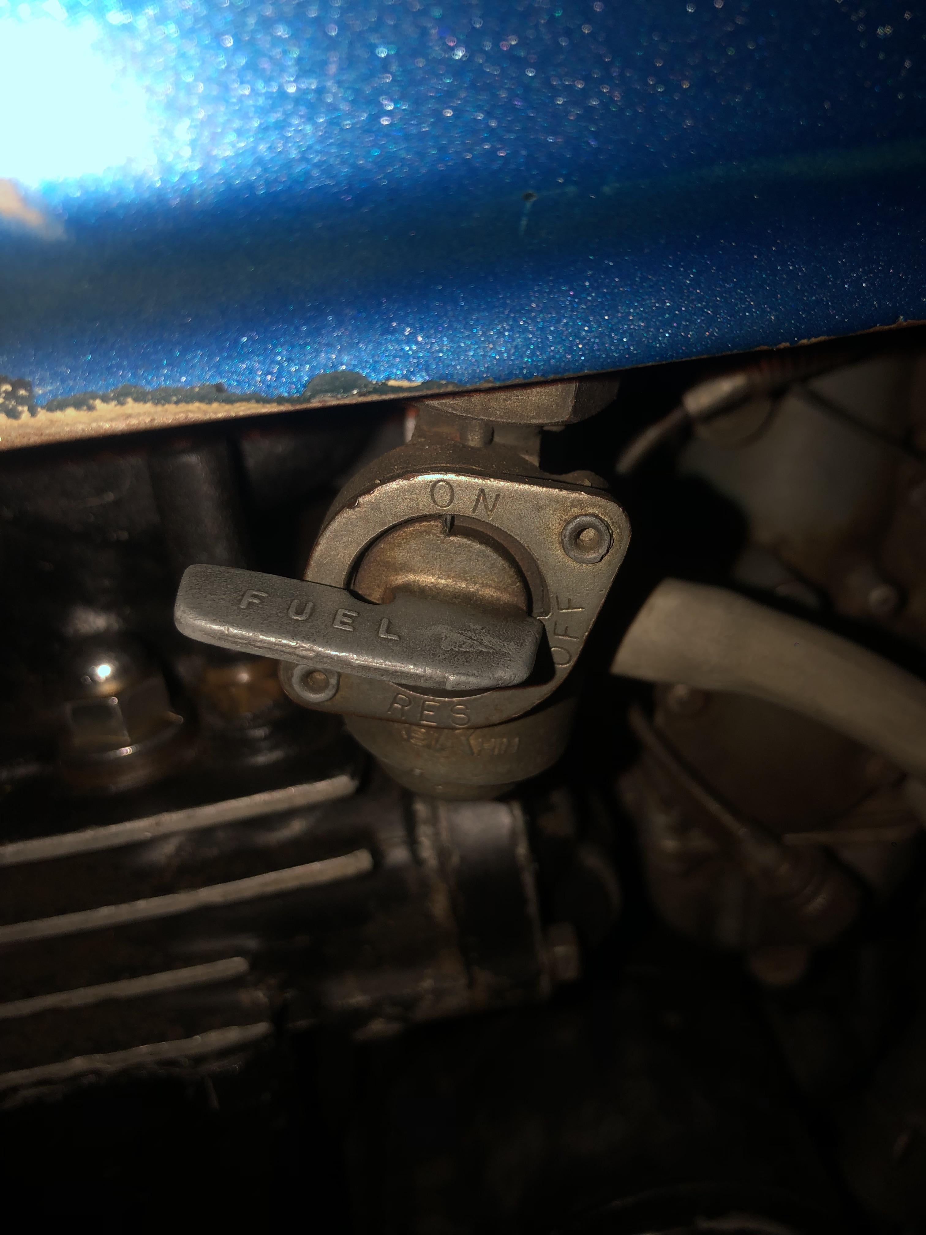 honda motorcycle should reserve be open or closed when filling