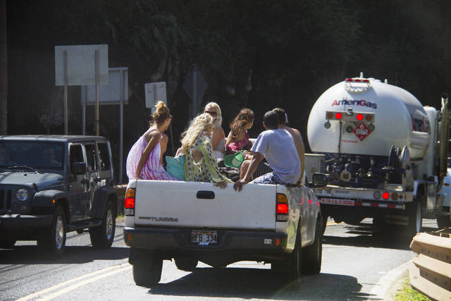 Riding in the Back of a Pickup Truck: Legalities and Safety Tips