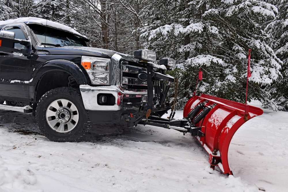 Pickup Truck Plowing Snow Safely: Avoiding Accidents and Damage